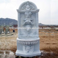 Wholesale stone art antique white marble decor on wall lion and male head waterfall fountain
